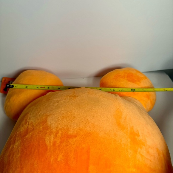 decorative throw pillow in the shape of a Mickey Mouse Pumpkin jack-o'-Lantern. - Picture 9 of 12